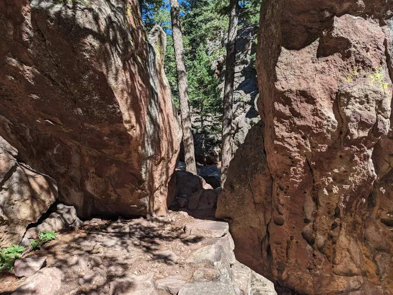 Mallory Cave Trail between two boulders