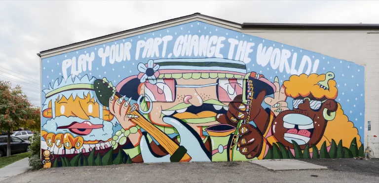 Colorful mural reading, "Do your part, change the world."