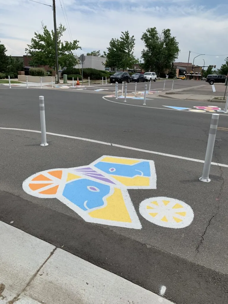 Paint on pavement at a protected bike lane in Boulder