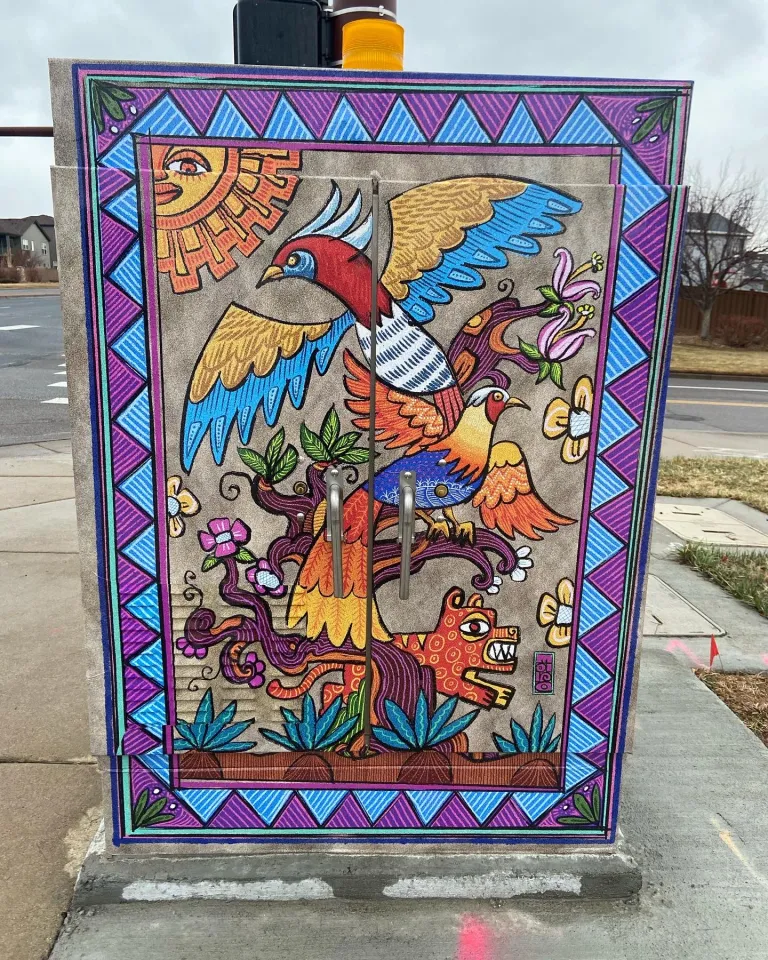 Electrical box with fictionalized nature motifs and geometric boarder 