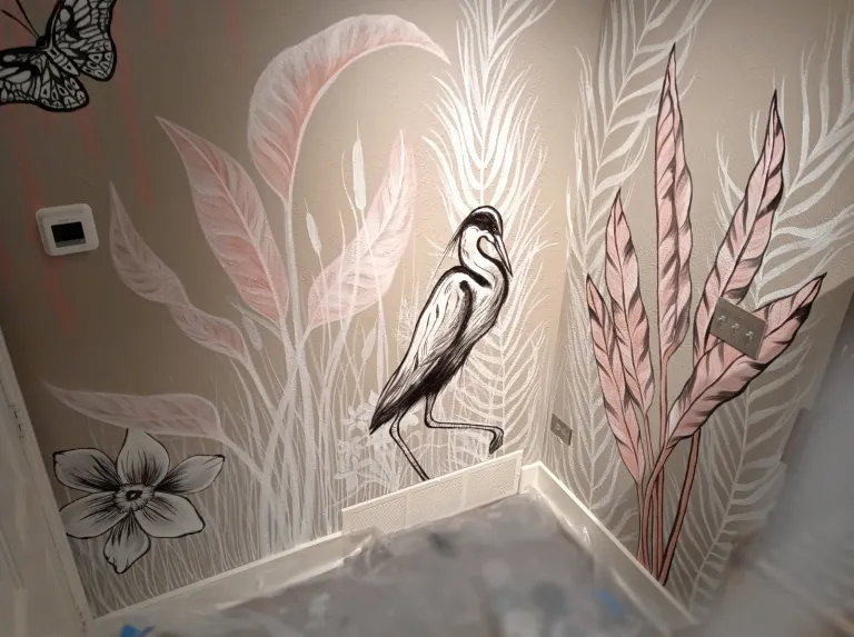 Multi-wall mural of a heron and plants 