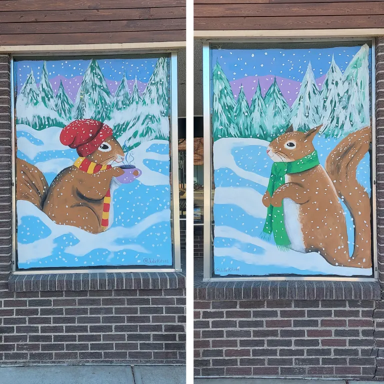 Two squirrels in a winter scene 
