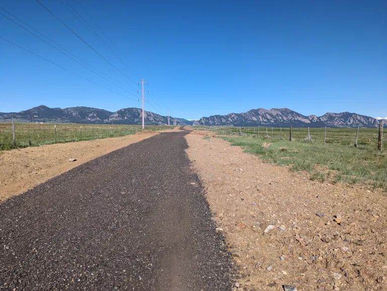 Coalton Trail - a wide gravel path heading west