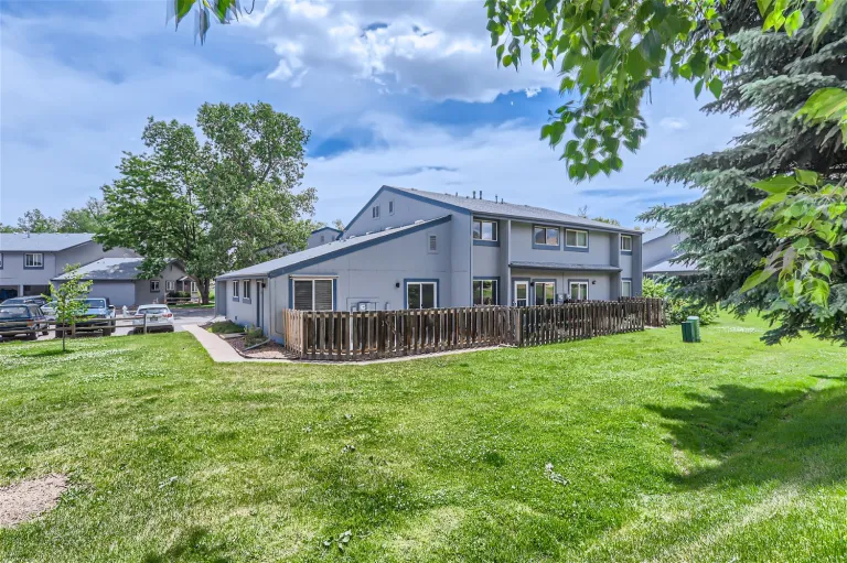 Outside picture looking at house and back yard