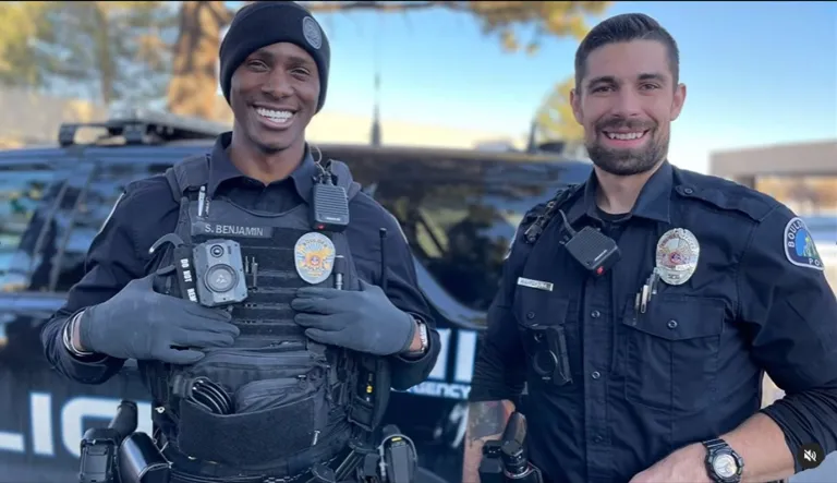 Two Boulder Police Officers smiling for photo