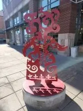 Close up photo of the sculpture and the placard 