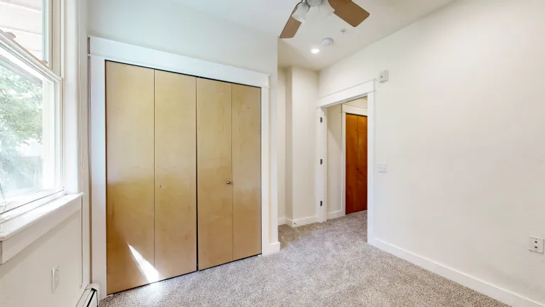 Other view of room with window bright light coming through