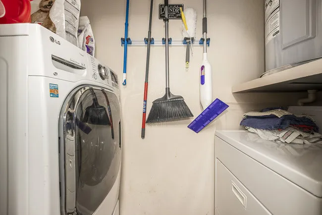 2510 Taft Unit 305 Laundry area with washer and dryer