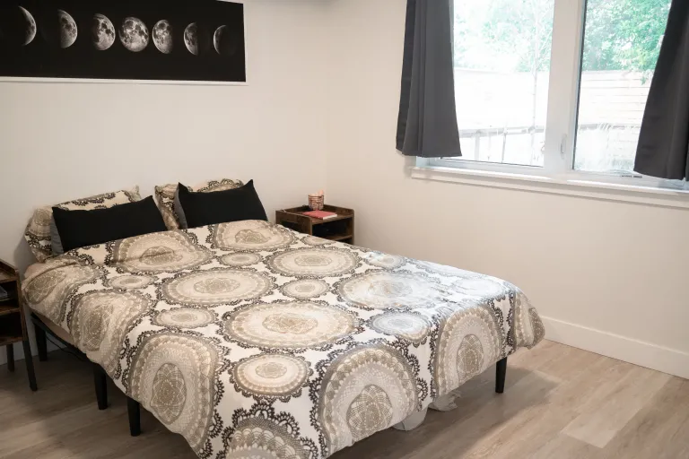3261 Airport Rd Unit D-105 Bedroom with bed and window view