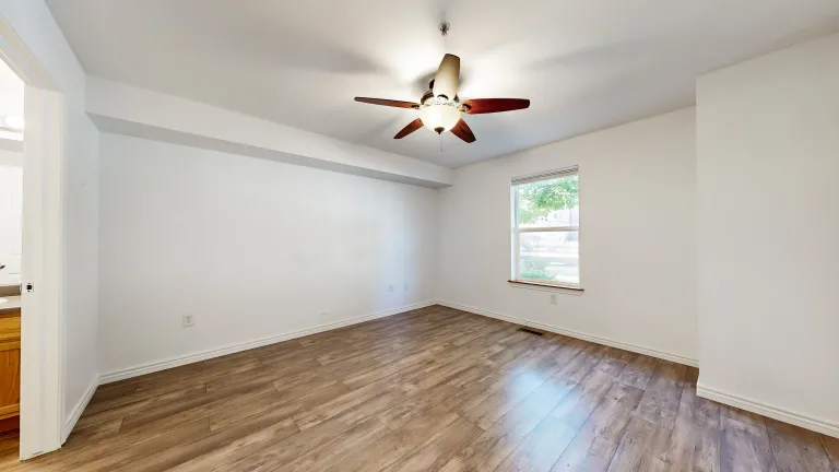 Room view with window ceiling fan