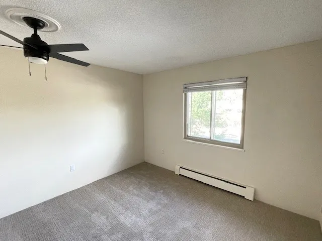 3150 Iris Ave #F211 - second bedroom with new ceiling fan