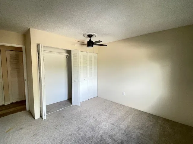 3150 Iris Ave #F211 - second bedroom double closet new carpet