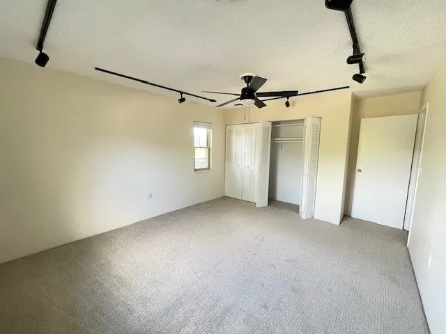 3150 Iris Ave #F211 - primary bedroom double closets new carpet