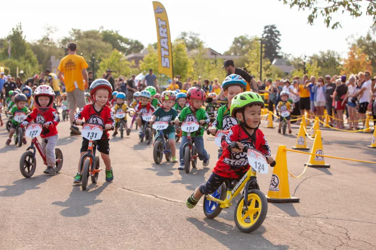 Kids racing on bicycles