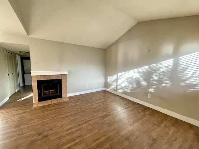 5540 Stonewall Pl 16 - Interior living room with wood burning fireplace