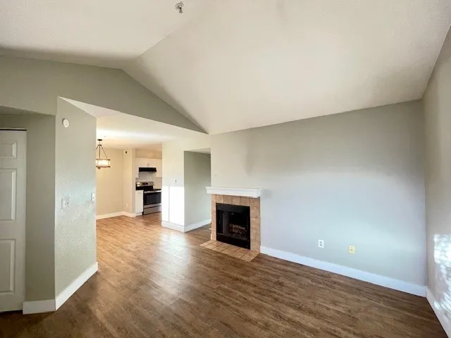 5540 Stonewall Pl 16 - Interior living room with view to dining and kitchen