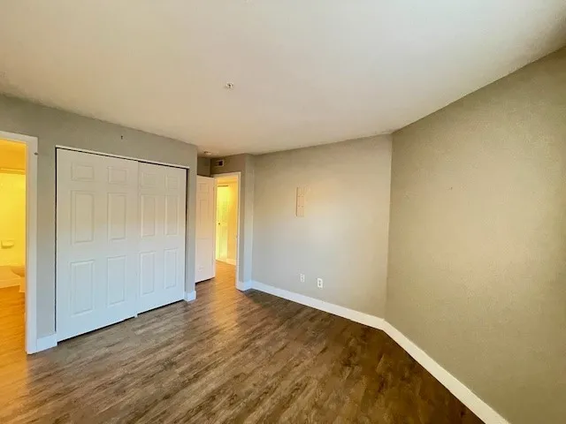 5540 Stonewall Pl 16 - Interior primary bedroom with view of large closet and bathroom