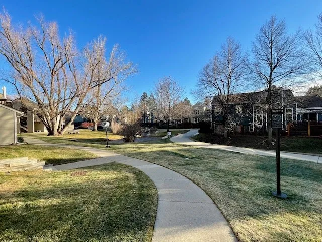 5540 Stonewall Pl 16 - Exterior green space with path and trees