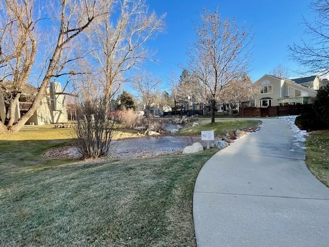 5540 Stonewall Pl 16 - Exterior pathway leading to private lake