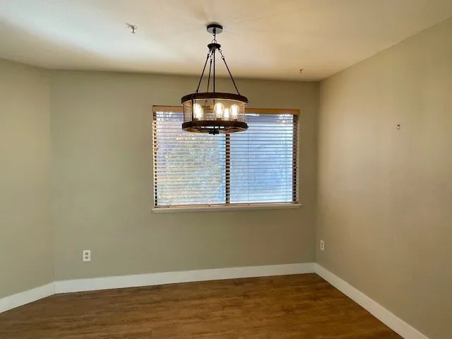 5540 Stonewall Pl 16 - Interior dining room with rustic light fixture