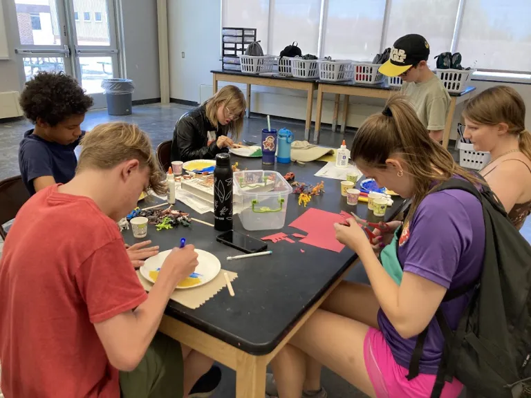 Amico campers creating an arts and crafts project