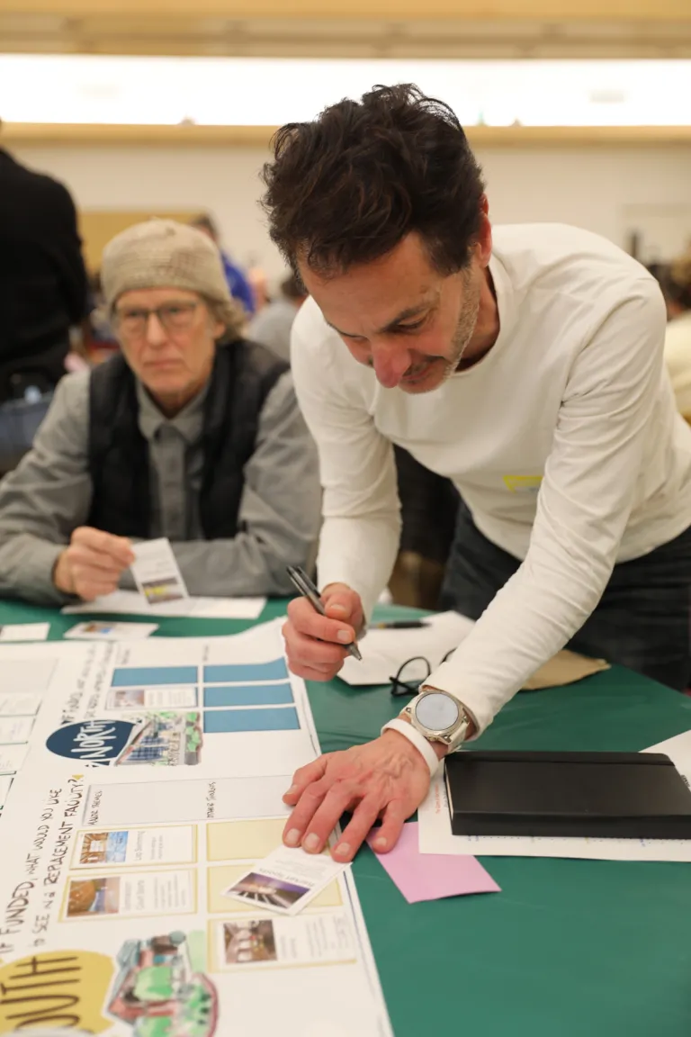 A community member participates in an engagement activity in January 2025.