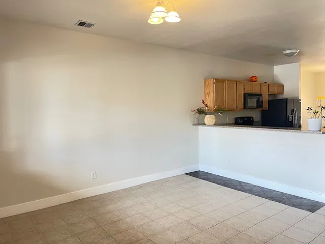 2800 E Aurora Ave #110 Living room facing kitchen