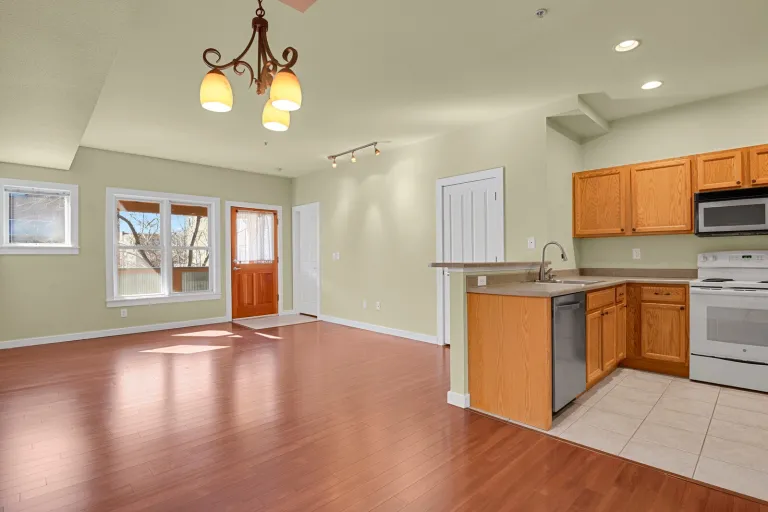3223 Iron Forge Pl 108 - living room and kitchen