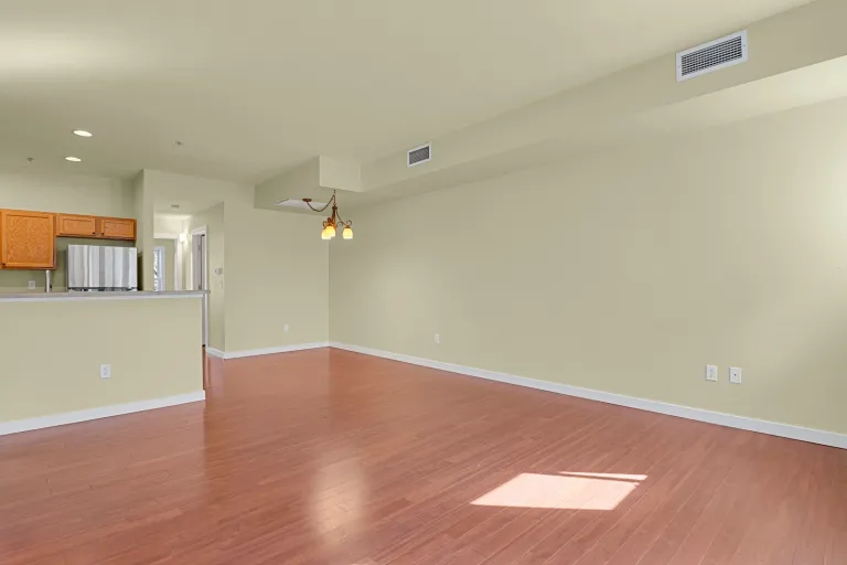 3223 Iron Forge Pl 108 - living room looking to dining and kitchen