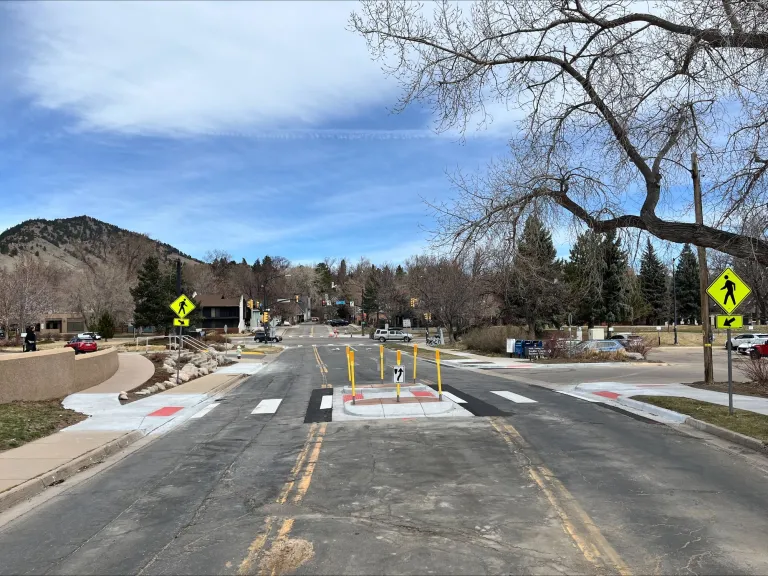 6th Street South of Boulder Canyon Drive after pedestrian crossing treatment with crosswalk and median and signage