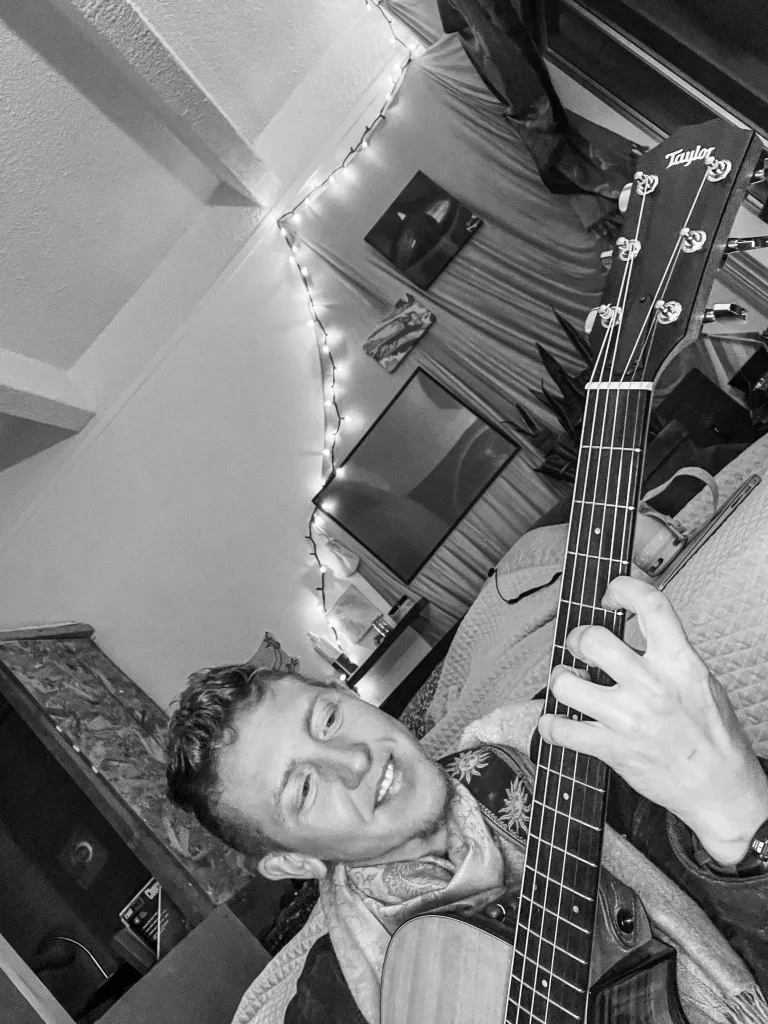 Andy plays guitar.