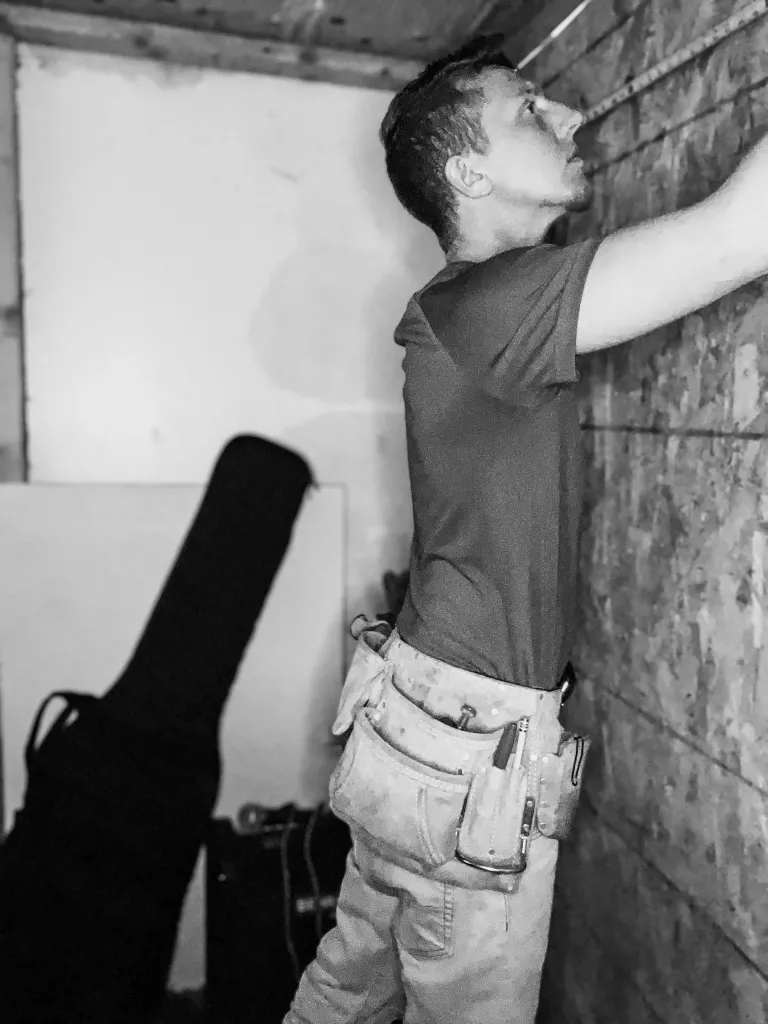 Andy working on a music studio. 