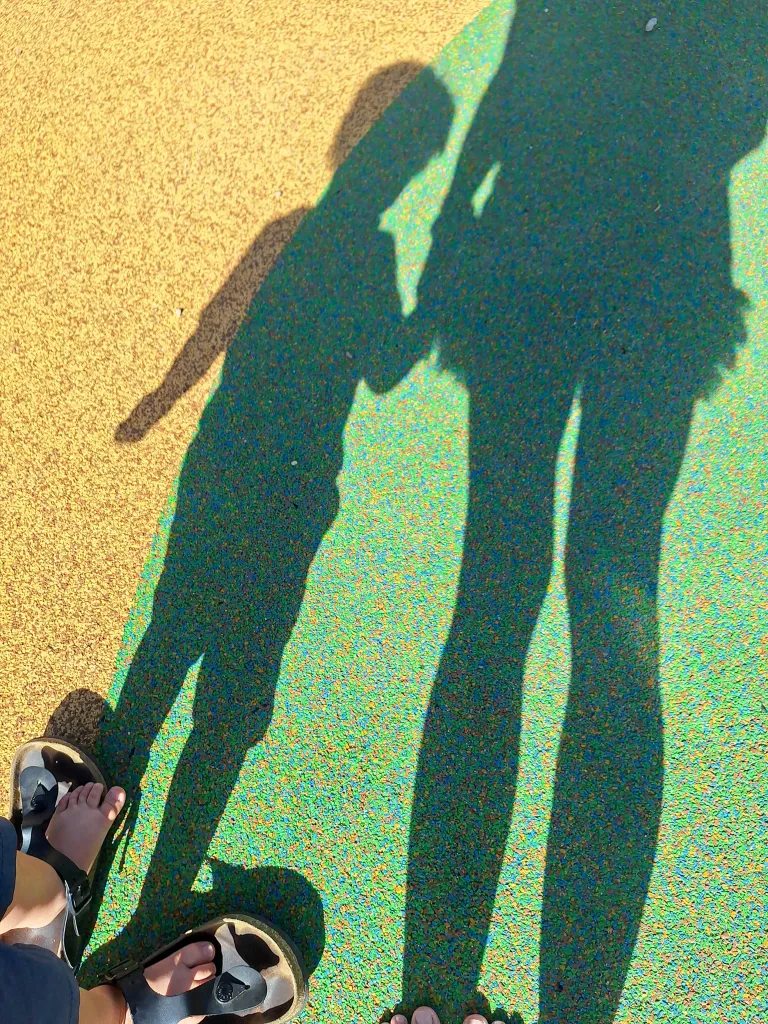 Shadow of a mother and child.