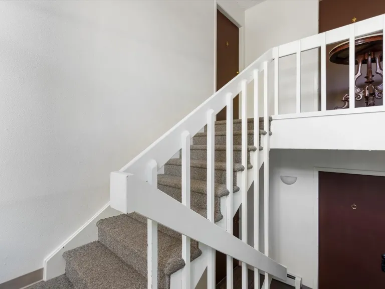 3335 Chisholm Trl 202 - Common building stairwell