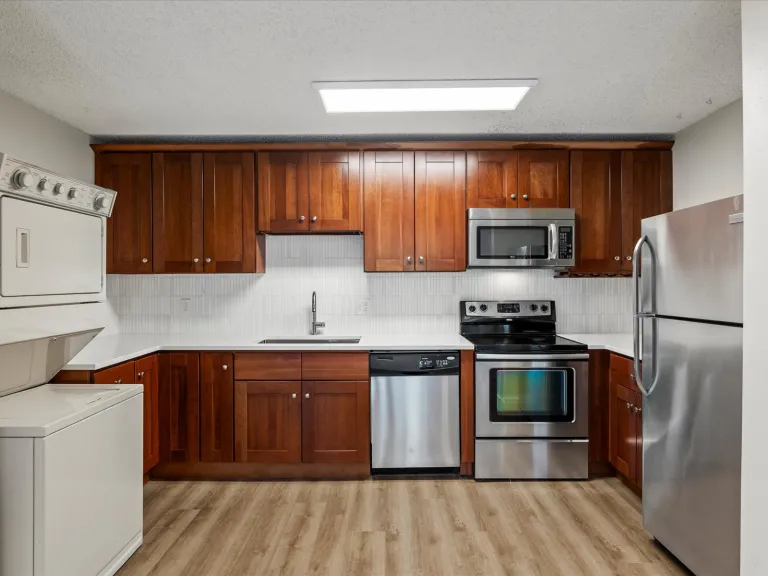 3120 Corona Trl L301 - Kitchen with Stacked Laundry