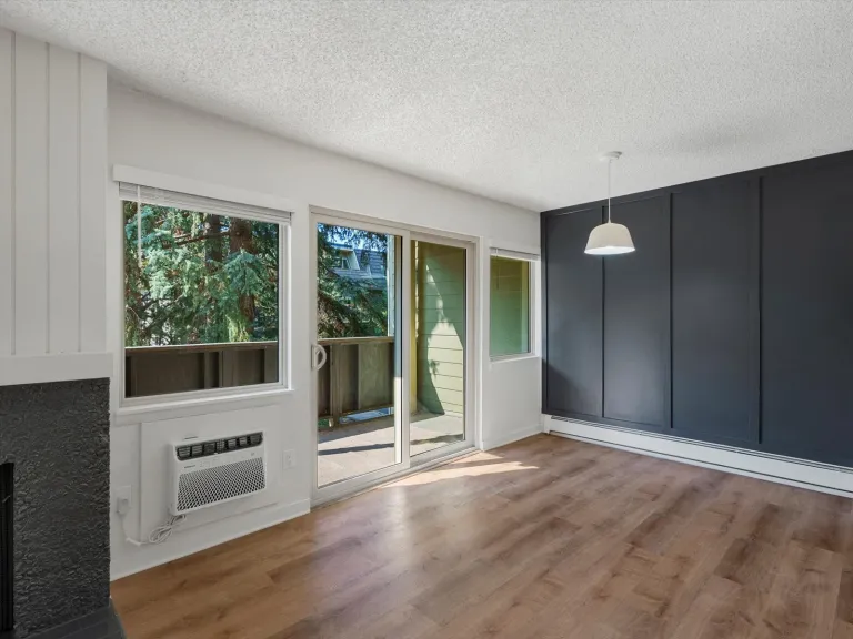 3335 Chisholm Trl 202 - Living Room to Balcony