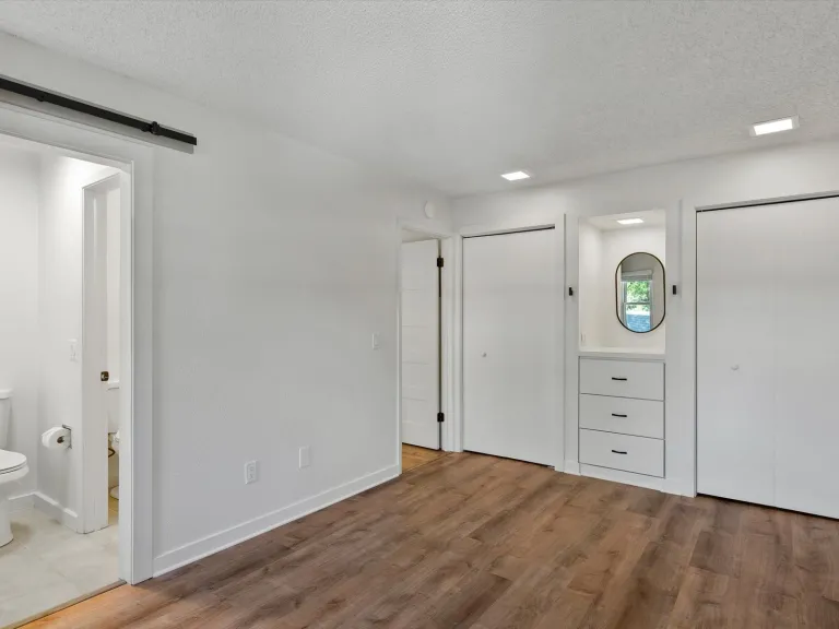 3335 Chisholm Trl 202 - Primary Bedroom