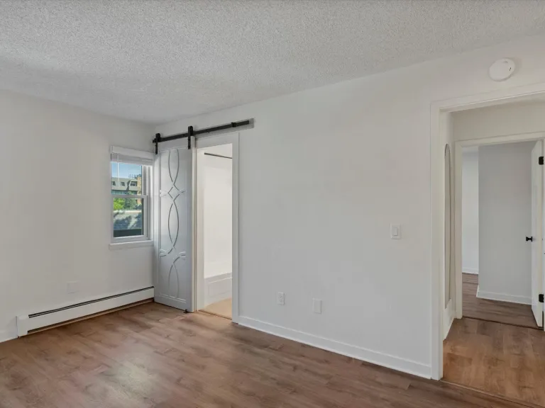 3335 Chisholm Trl 202 - Primary Bedroom