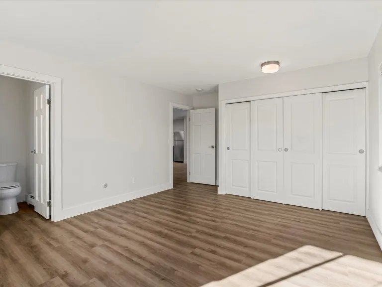 3120 Corona Trl L301-Primary Bedroom with half Bathroom