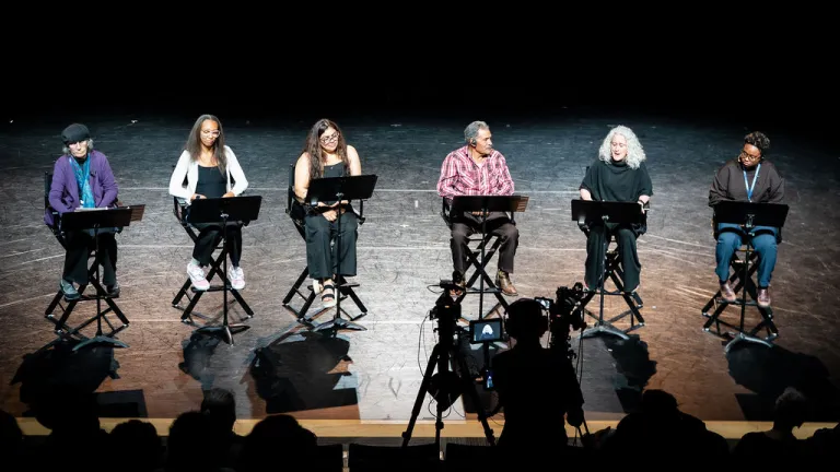 Elevate Boulder participants on stage during their monologue performance at Motus Theater.