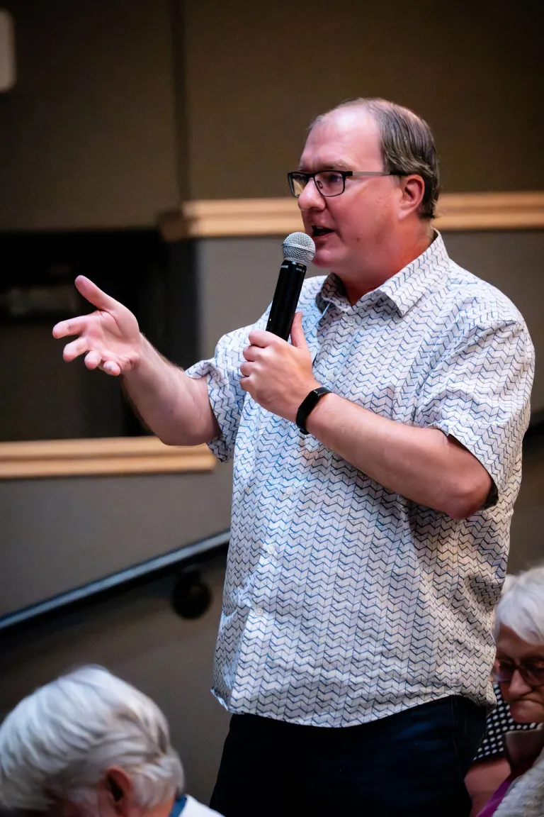 Mayor Aaron Brocket speaking during the Elevate Boulder monologue performance at Motus Theater.