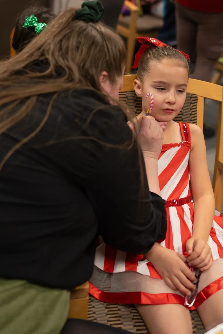 face painting at the winter dance concert 2024
