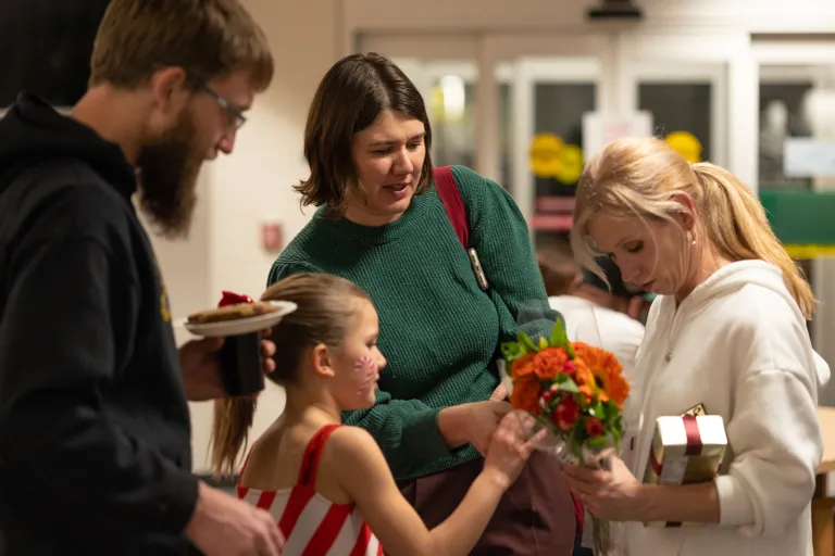 a dancer gives her teacher flowers