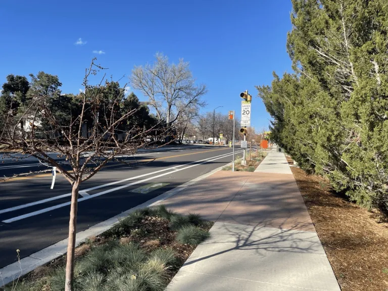 19th street sidewalk, bus stop and buffered bike lane