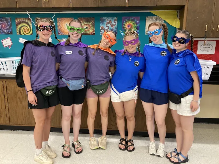 Camp Amico staff show off their super hero costumes.