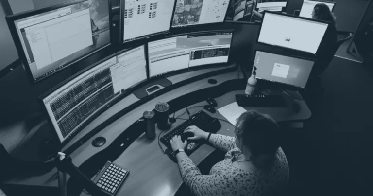 Boulder Dispatcher working at computer