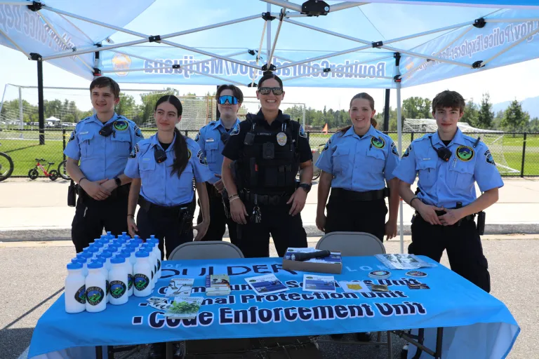 City code enforcement team running a table at What's Up Boulder event