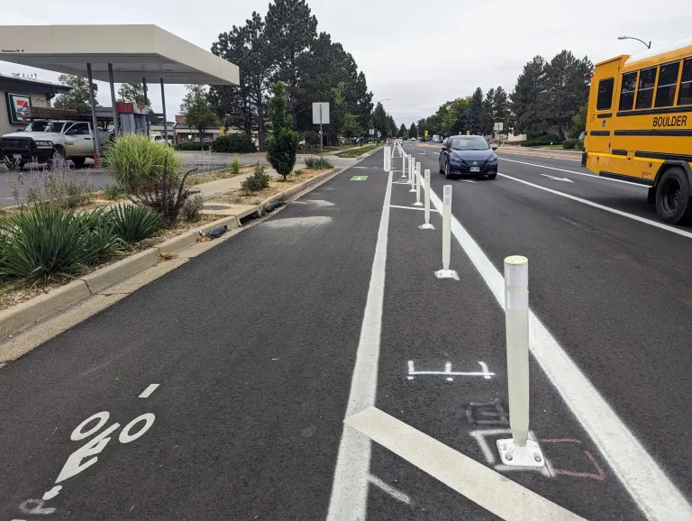buffered bike lane with flex posts and paint