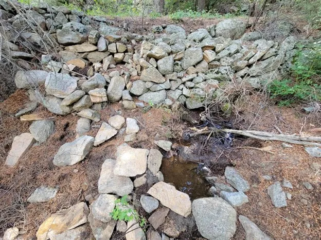 Overview of Rock Retaining Wall and Catch-Basin, view to the Southeast