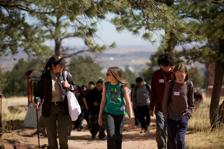 children hiking with OSMP ranger